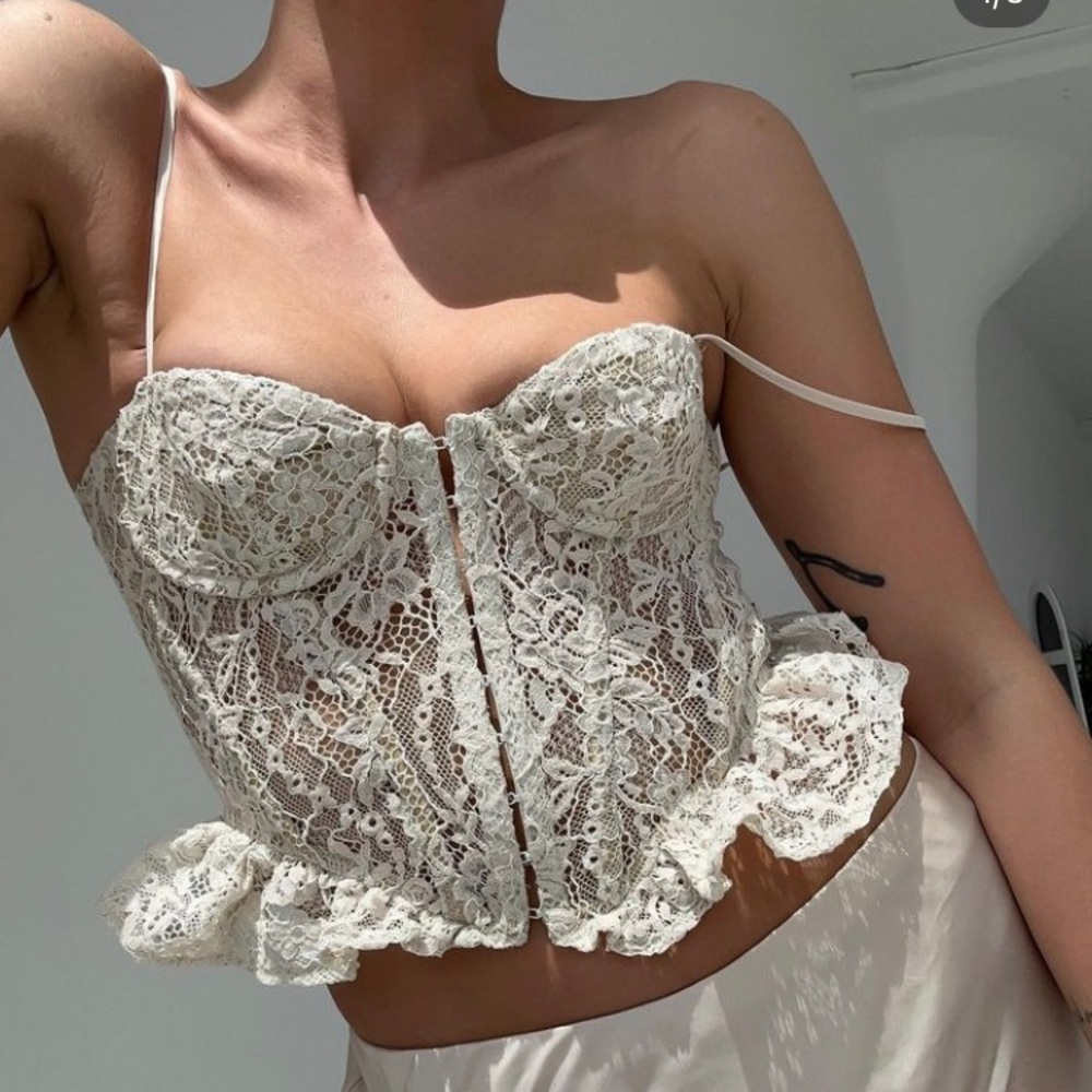 Rumored cabaret corset top in cream
